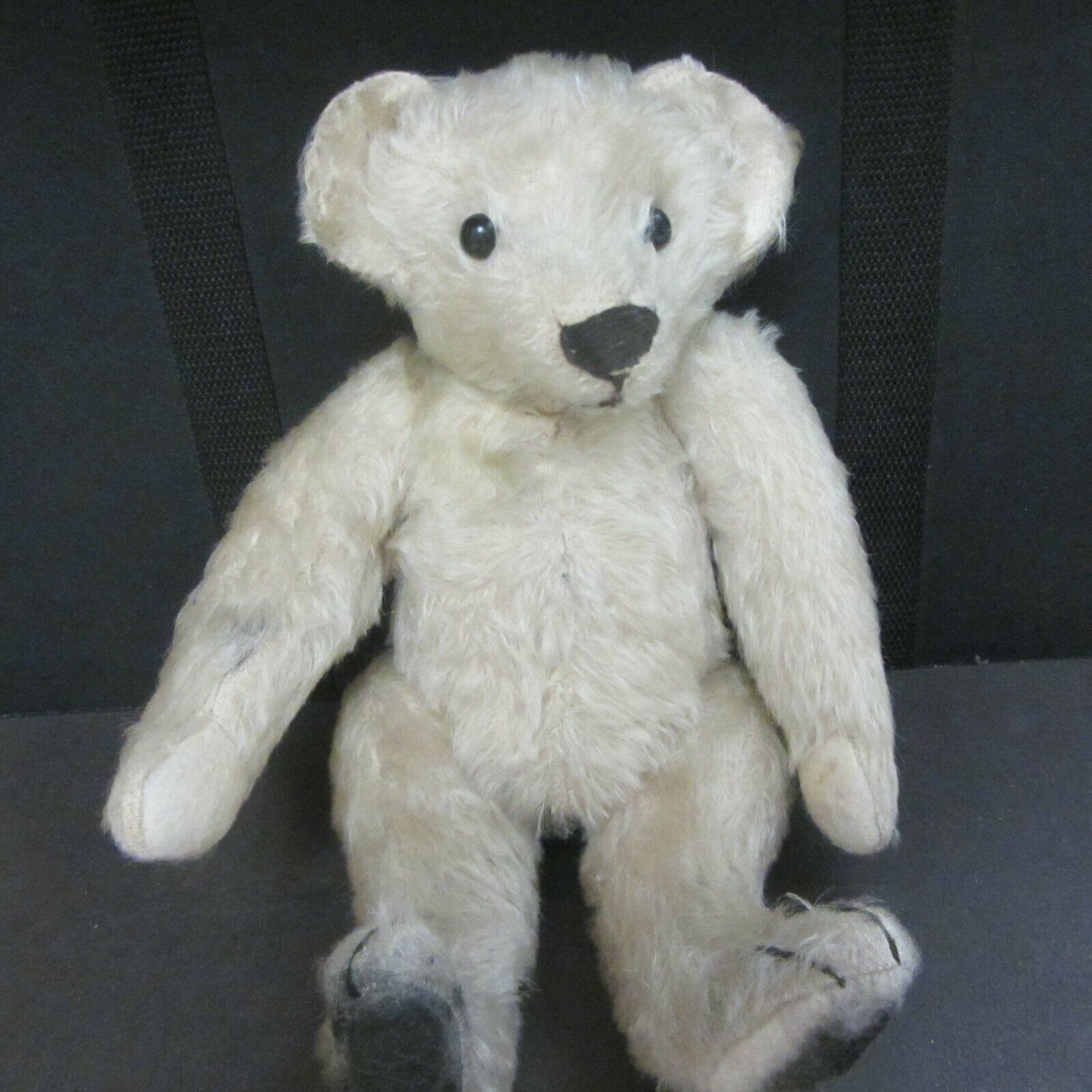 This Is "inky' White Antique Bear